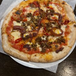 Blue Duck Italian Kitchen - Maverick pizza - italian sausage / caramelized onions / calabrian chili / chili oil