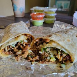 Micky’s Hot Dogs - $12 Al Pastor Burrito.