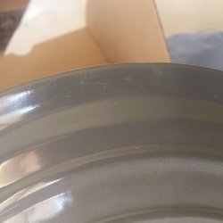 All around the edges of the pan.
