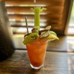 The Settlers Inn - "Settlers Inn Bloody Mary" (blue cheese olives, alpine beef stick, aged cheddar, dilly beans, pepperoncini, celery)