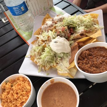 Avocado Mexican Grill - Nachos with a side of rice and beans - Mexican Near Me - Celebration, Florida