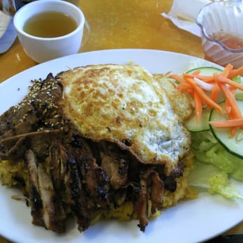 Minh Hai Restaurant - Grilled chicken, beef on yellow rice and a fried egg on top - Vietnamese Near Me - Cranston, Rhode Island Minh Hai Restaurant - Grilled chicken, beef on yellow rice and a fried egg on top - Vietnamese Near Me - Cranston, Rhode Island