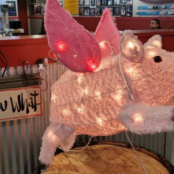 Moe’s Original BBQ - a pig with wings - American Near Me - Hoover, Alabama