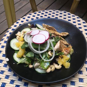 Outro - mandarin chicken (gf)  grilled chicken, mesclun, orange, cashew with yuzu poppy seed dressing - Cafes Near Me - New York, New York
