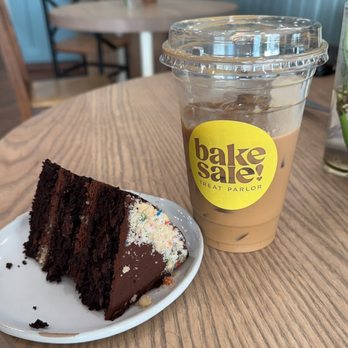 Bakesale Treat Parlor - Vegan chocolate cake and two shots of decaf espresso on ice with oat milk - Bakeries Near Me - Wichita, Kansas