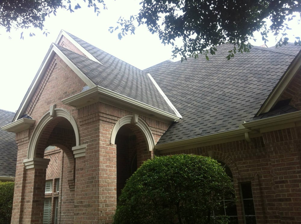 Slide of Compass Roofing