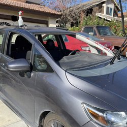 AAA Glass - Cracked windshield out and prepping the new one for install