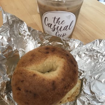 The Casual Cup - Onion bagel with egg and cheese (yum!!), specialty small iced coffee (surprise flavor) - Coffee & Tea Near Me - Braintree, Massachusetts