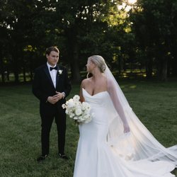 J. Major's Bridal Boutique - Bride celebrating in J. Major's Bridal Boutique Wedding Dress in Charlotte.