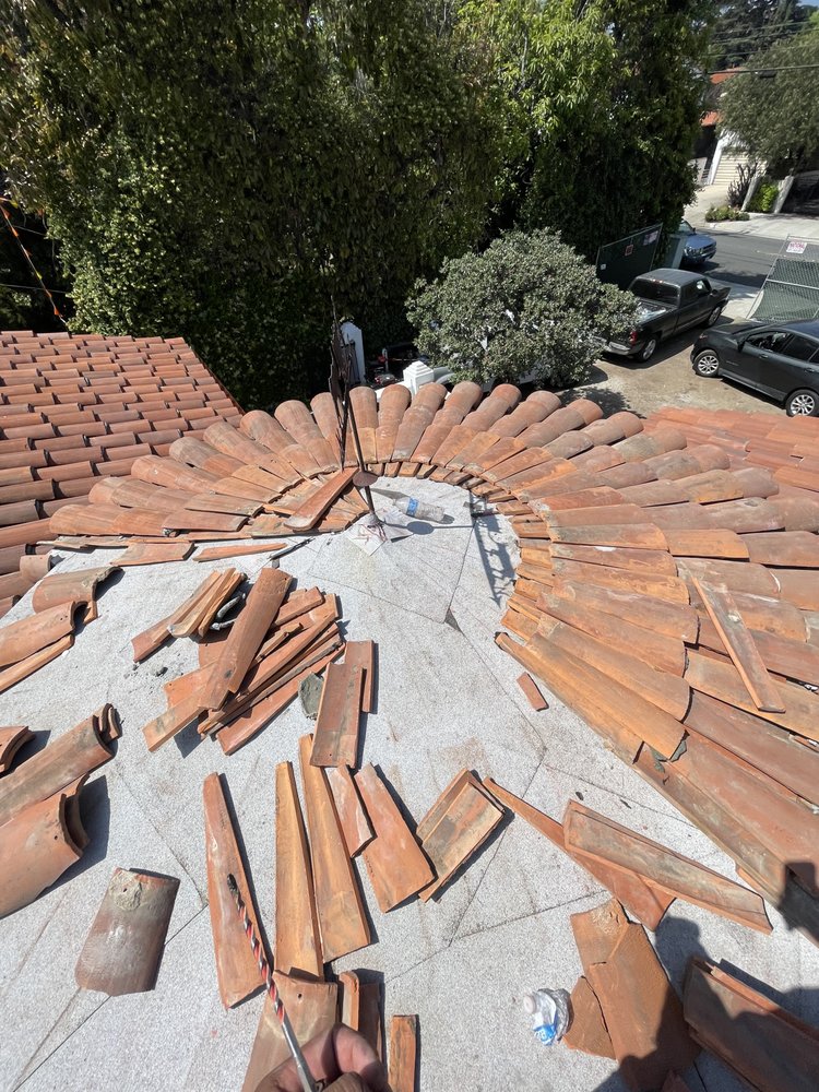 Slide of Dilligent Roofing