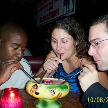 Bamboo Hut - they're doing some serious sippin'!  LoL - i don't drink "shared" drinks...cooties! AACK!  lol - Tiki Bars Near Me - San Francisco, California