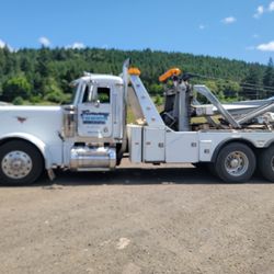 Economy Towing & Truck Repair Shop - Towing Truck