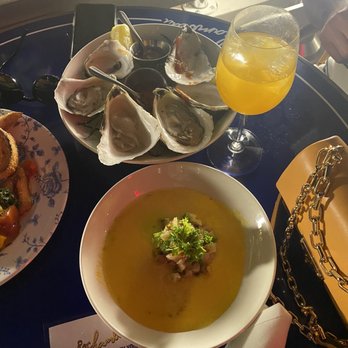 Rochambeau - Oysters on the 1/2 Shell and yellow tomato gazpacho - French Near Me - Boston, Massachusetts Rochambeau - Oysters on the 1/2 Shell and yellow tomato gazpacho - French Near Me - Boston, Massachusetts