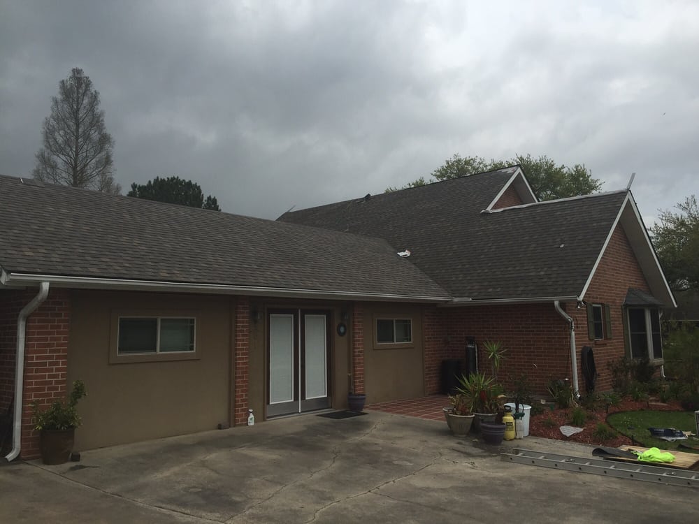 Slide of Ford Roofing Service