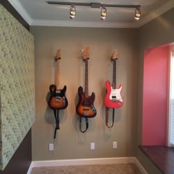 The Guitar Consultant - I teach from a custom-designed, built-to-purpose teaching studio, complete with waiting room and dedicated restroom. And these guitars.