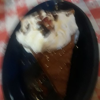 Fat Bob's Smokehouse - Bourbon Bacon Sweet Potato Pie topped with Whipped cream Carmel drizzle.  Everything tasted good with Bacon! - Barbeque Near Me - Buffalo, New York