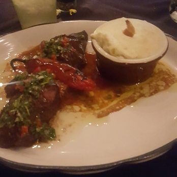 Moonshine Grill - The steak plate with green salsa on top . Definitely a must try. Meat is juicy & tender with a hot kick - Southern Near Me - Austin, Texas