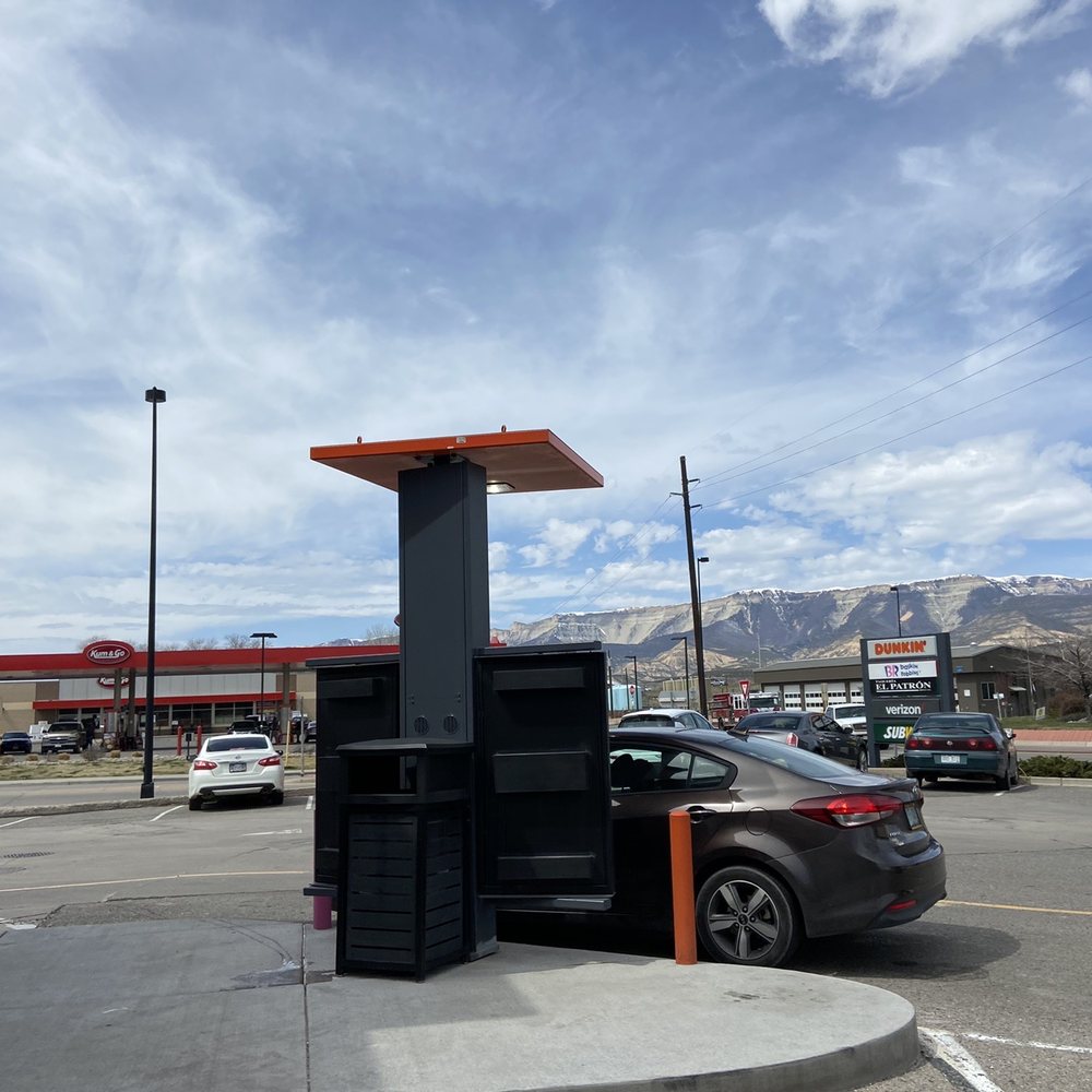 Dunkin' -  a parking meter in a parking lot - Coffee & Tea Near Me - Rifle, Colorado