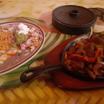Los Corrales - two plates of food on a table - Mexican Near Me - Show Low, Arizona