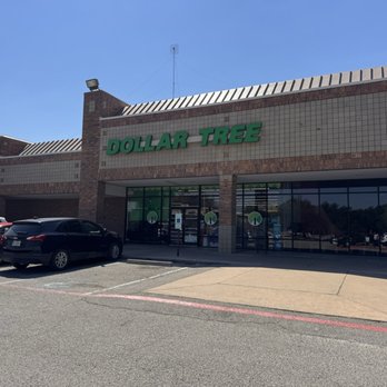 Dollar Tree - Dollar Tree storefront in Cedar Park, TX, with parking lot and several parked cars in front. - Discount Store Near Me - Cedar Park, Texas