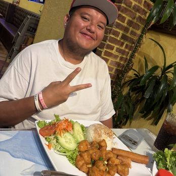 Pho Express - My son with his favorite orange chicken and steamed rice also some eggrolls and a salad - Vietnamese Near Me - Long Beach, California Pho Express - My son with his favorite orange chicken and steamed rice also some eggrolls and a salad - Vietnamese Near Me - Long Beach, California