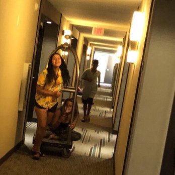 Hyatt Place - Kids playing with luggage rack someone left by our door. - Venues & Event Spaces Near Me - Orlando, Florida Hyatt Place - Kids playing with luggage rack someone left by our door. - Venues & Event Spaces Near Me - Orlando, Florida