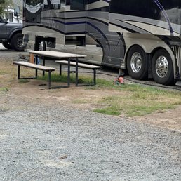 The small area with the picnic table is space #63. The picnic table needs to be placed someplace else besides next to the sewage dump. The small area with the picnic table is space #63. The picnic table needs to be placed someplace else besides next to the sewage dump.