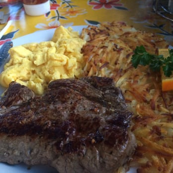 Beach Break Cafe - steak and eggs comes with hash browns and a lot of toast with jelly. - Breakfast & Brunch Near Me - Oceanside, California Beach Break Cafe - steak and eggs comes with hash browns and a lot of toast with jelly. - Breakfast & Brunch Near Me - Oceanside, California