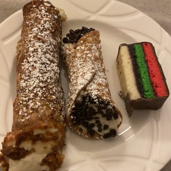 Bova's Bakery - Florentine Shell Ricotta cannoli, Ricotta Cannoli with chocolate chips, and a rainbow cookie - Bakeries Near Me - Boston, Massachusetts Bova's Bakery - Florentine Shell Ricotta cannoli, Ricotta Cannoli with chocolate chips, and a rainbow cookie - Bakeries Near Me - Boston, Massachusetts