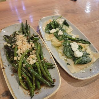 Moku Kitchen - Szechuan Stir-Fry Green Beans with Mac Nuts (left) and Roasted Squash Ravioli (right) - Cocktail Bars Near Me - Honolulu, Hawaii