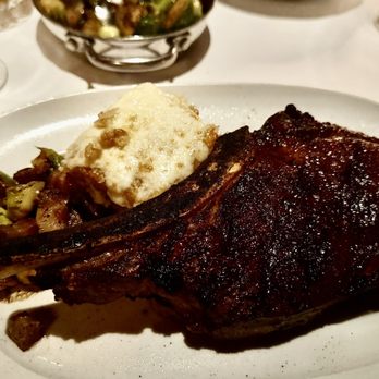 Durant's - Bone-In Ribeye, 22oz, wet aged, not great, dry, bland with Brussels (not great) and scalloped potatoes (excellent). - Steakhouses Near Me - Phoenix, Arizona