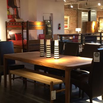 Dania Furniture - Cool dining tables and accent pieces (note the bunkbeds in the background) - Furniture Stores Near Me - Spokane, Washington