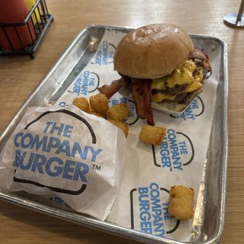 The Company Burger - The Company Burger double with cheese and added bacon with tater tots - Burgers Near Me - New Orleans, Louisiana