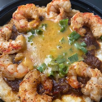 Southern Crab Sacks - Shrimp and Grits with Cajun gravy - Seafood Near Me - Farmington Hills, Michigan Southern Crab Sacks - Shrimp and Grits with Cajun gravy - Seafood Near Me - Farmington Hills, Michigan