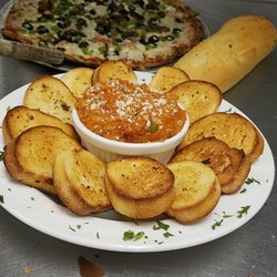 Zaffiro's Pizzeria - Parkwood - Nothing more Italian then crostini dipped in bruschetta as an appetizer followed by a vegetarian pizza. Made my taste buds jump with joy.