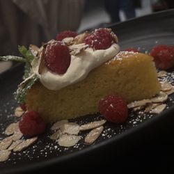 Abigail's American Bistro - Lemon almond olive oil cake with fresh whipped cream and raspberries