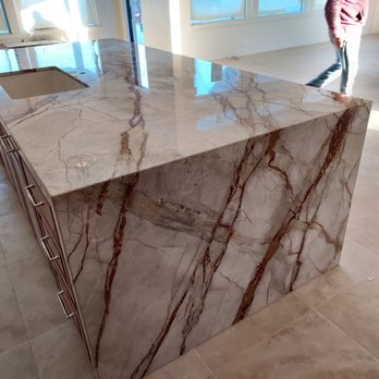 Texas Marble and Floors - a man standing in a room - Flooring Near Me - Hallsville, Texas Texas Marble and Floors - a man standing in a room - Flooring Near Me - Hallsville, Texas