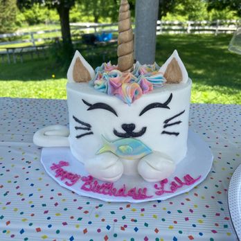 NCH Bakery - a white cake with a unicorn horn on top - Bakeries Near Me - Cincinnati, Ohio