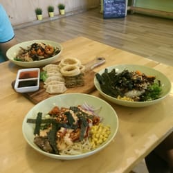 Jin's Bibimbar - Bibimbap for three.  Along with salt  pepper squid,  Kimchi dumpling