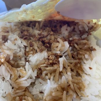 Shlap Muan Chicken Wings - Garlic and soy sauce on an undercooked rice. Rice was so hard. - Chicken Wings Near Me - Long Beach, California Shlap Muan Chicken Wings - Garlic and soy sauce on an undercooked rice. Rice was so hard. - Chicken Wings Near Me - Long Beach, California