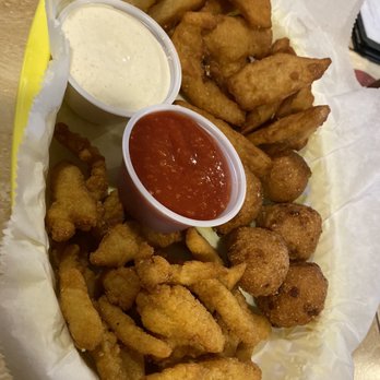 Clermont Oyster Bar - Clams, fried onions and hush puppies - Seafood Near Me - Clermont, Florida Clermont Oyster Bar - Clams, fried onions and hush puppies - Seafood Near Me - Clermont, Florida