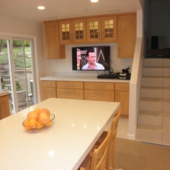 South Bay Remodel - a kitchen with a flat screen tv - Flooring Near Me South Bay Remodel - a kitchen with a flat screen tv - Flooring Near Me