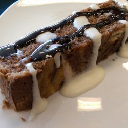 To The Nines - Marble cake w/ vanilla icing & chocolate sauce. Well-balanced sweetness & tender crumb made for a perfect coffee pairing.