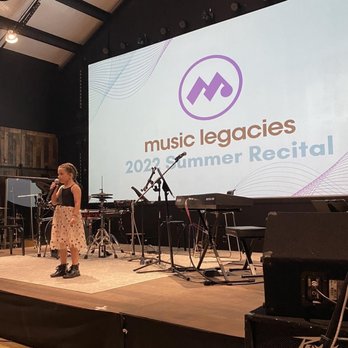 Music Legacies - Vocal student performing at our 2022 Summer Recital. Voice lessons available in-person and online! - Musical Instruments & Teachers Near Me - Pembroke Pines, Florida Music Legacies - Vocal student performing at our 2022 Summer Recital. Voice lessons available in-person and online! - Musical Instruments & Teachers Near Me - Pembroke Pines, Florida
