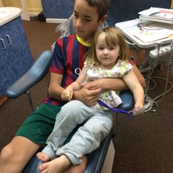 Raymond Katz , DMD - I love this dental office! They let elly sit on her brother's lap for her first check up. Now she's a pro.