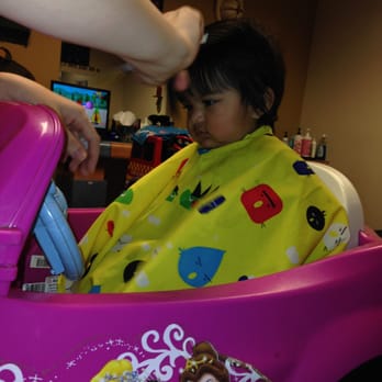 Corky's Cuts 4 Kids - My daughter at 10 months actually sitting down enjoying her haircut - Hair Salons Near Me - Clovis, California Corky's Cuts 4 Kids - My daughter at 10 months actually sitting down enjoying her haircut - Hair Salons Near Me - Clovis, California