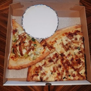 Luigi’s Pizza - two slices of pizza in a box - Pizza Near Me - Bayside, New York
