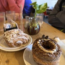 Art Is In Bakery - Front: O-Towner - Chocolate Hazelnut ($8.75), Back: Chocolate Almond Croissant (BOGO)