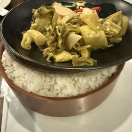 Rice and free pickled green mustard Rice and free pickled green mustard