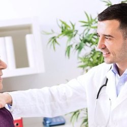 Indianapolis Men's Clinic - Doctor speaking with patient about erectile dysfunction